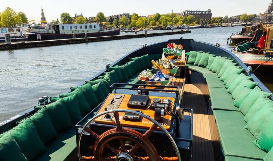 Amsterdam: Guided Open Boat Canal Cruise Including Drink - Practical details before you book