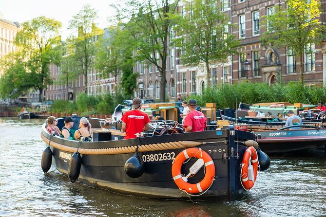 Amsterdam: Guided Open Boat Canal Cruise Unlimited Drinks Option - The Rijksmuseum, Museumplein, and Amsterdam’s cultural core