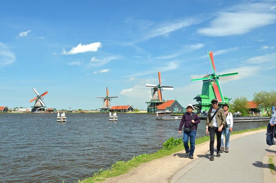 Amsterdam: Guided Zaanse Schans, Windmills & Cheese Tour - The coach ride into North Holland