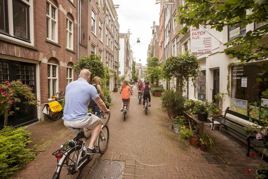 Amsterdam: Hidden Gems & Highlights Guided Bike Tour - Weather, clothing, and practical planning