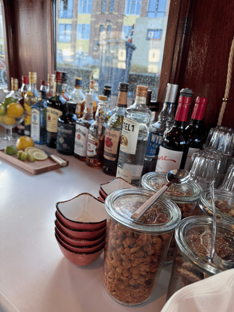 Amsterdam: Historic Boat Cruise with open bar and nibbles - Indoor or outdoor seating, depending on the weather