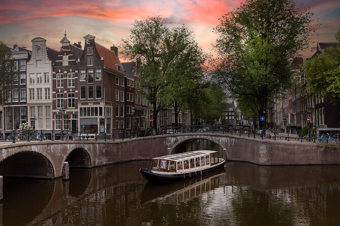 Amsterdam Historic Tour On Classic Saloon Boat - Under the Skinny Bridge