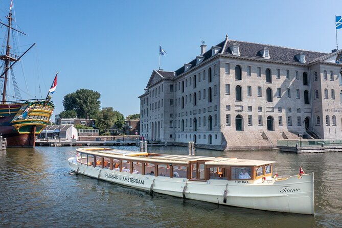 Amsterdam Historic Tour On Classic Saloon Boat - The opera house and a modern note