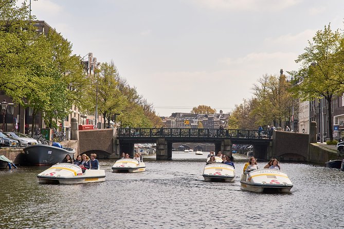 Amsterdam Independent Sightseeing by Pedal Boat - Checking in at one of two central piers