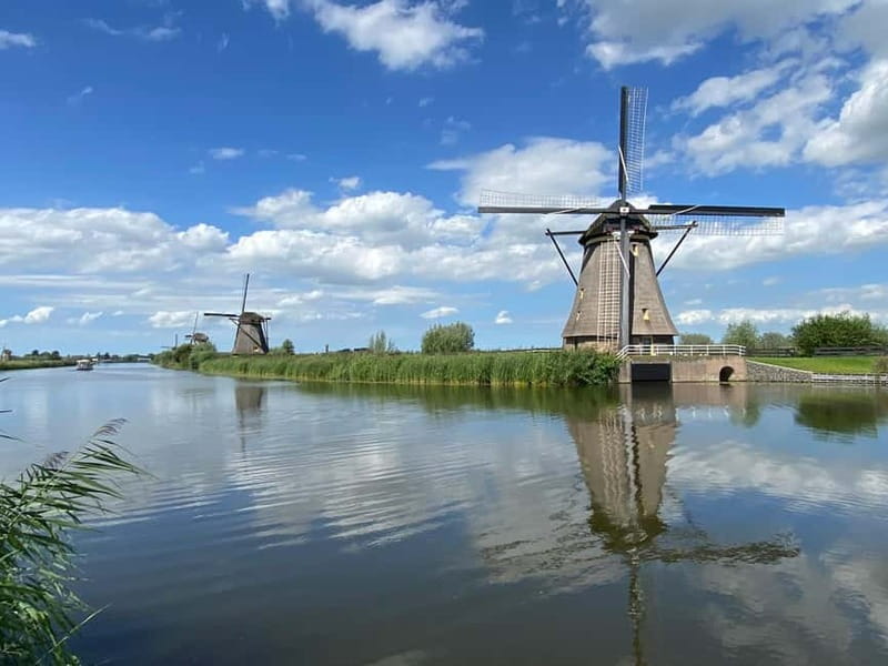 Amsterdam: Kinderdijk, Euromast, Delft and Den Haag Day Tour - Why this four-stop Dutch day works