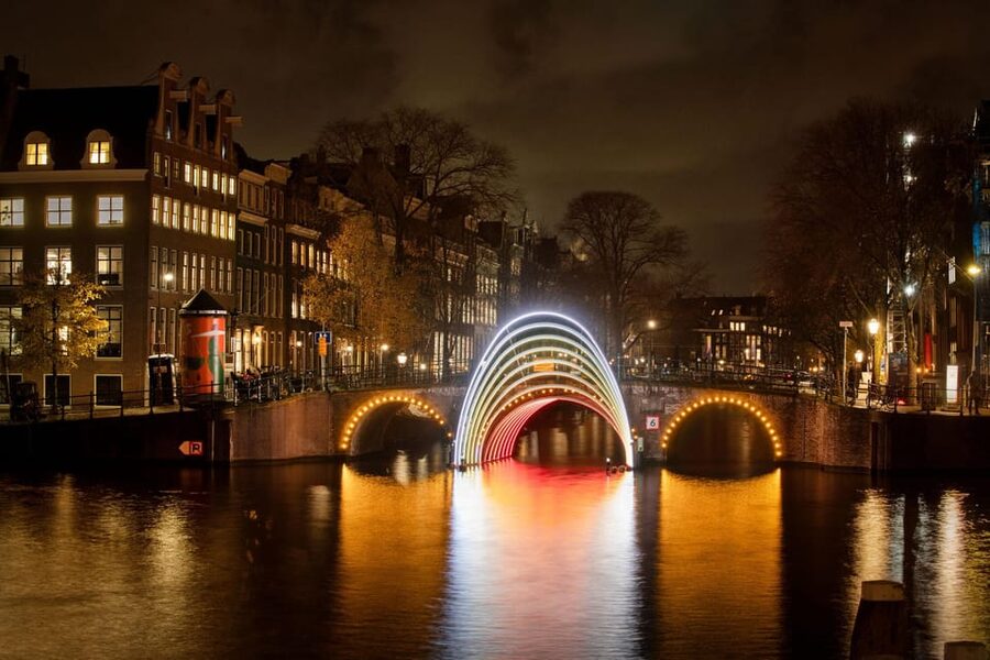 Amsterdam: Light Festival Boat Tour with Warm Drinks - Why the open boat is both the best feature and the main risk
