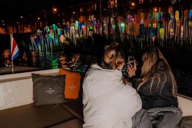 Amsterdam Light Festival: Canal Cruise + Bite & Unlimited Drinks - Boarding at Prins Hendrikkade 33A