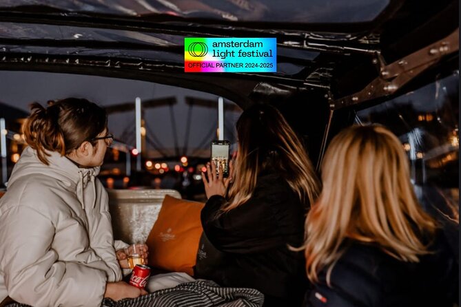Amsterdam Light Festival: Cruise Unlimited Drinks & Bite option - Passing ARTIS and the city’s eastern canal area