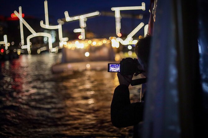Amsterdam: Light Festival Cruise with Unlimited Drinks Option - Passing Amsterdam’s romantic bridge