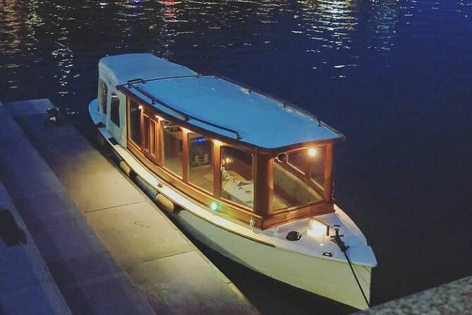 Amsterdam Light Festival Private Cruise With Welcome Drink - Old warehouses and the Maritime Museum