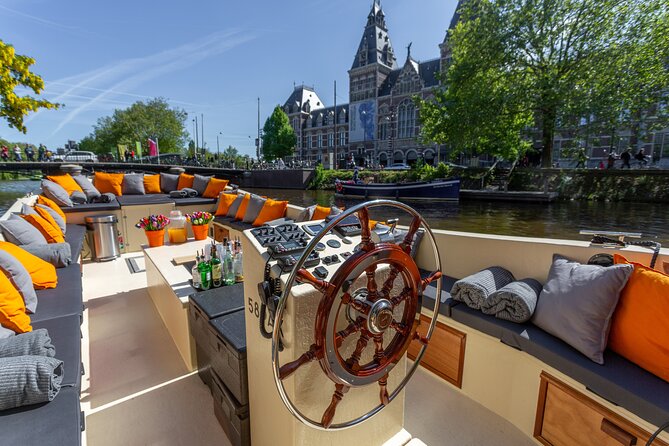 Amsterdam Light Festival: Saloon Boat Cruise + Hot Drinks & Bite - Seeing Amsterdam’s lights from the Canal Ring
