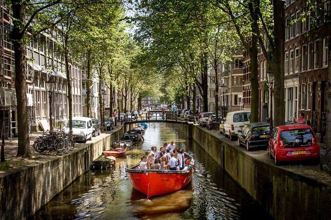 Amsterdam Light Festival: Saloon Boat Cruise + Hot Drinks & Bite - Booking, cancellation, and practical planning