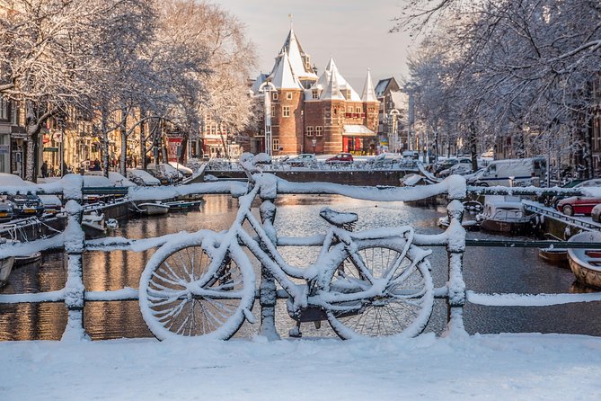 Amsterdam Light Festival Winter Walk with Stroopwafel Workshop - Munttoren and Amsterdam’s canal views