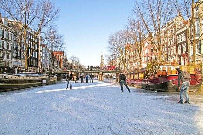 Amsterdam Light Festival Winter Walk with Stroopwafel Workshop - Starting at the Royal Palace on Dam Square