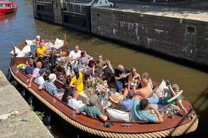 Amsterdam Luxury Boutique Boat tour with Unlimited Beer and Wine - Understanding the open-bar cost