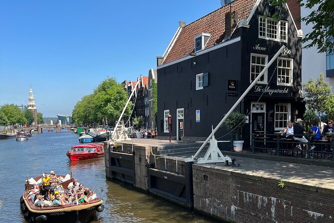 Amsterdam Luxury Boutique Boat tour with Unlimited Beer and Wine - What the small boat setting feels like