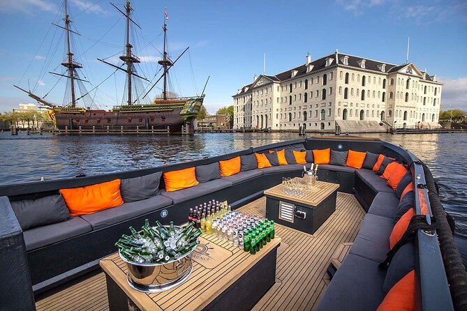 Amsterdam Luxury Canal Cruise + Unlimited Drinks & Bites option - Bloemenmarkt, Munttoren, and the 15 Bridges