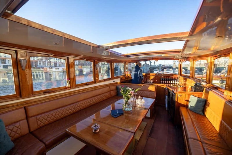 Amsterdam: Luxury Canal Cruise with Optional Snacks & Drinks - Open-air views, rain, and the best time to go