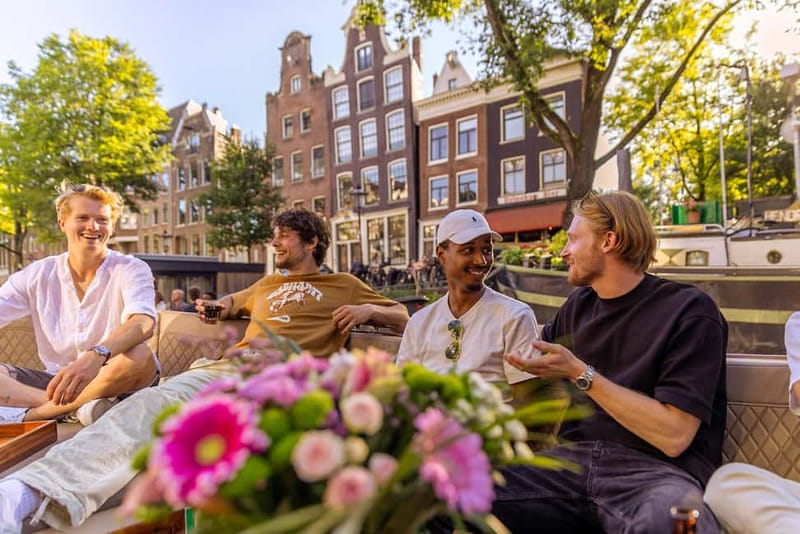 Amsterdam: Luxury Canal Cruise with Optional Snacks & Drinks - Along the Amstel: Skinny Bridge and the botanical garden