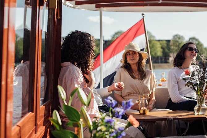 Amsterdam: Luxury Saloon Boat Cruise with Cocktails & Waffle - Booking Advice and Cancellation Terms