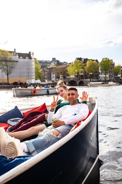 Amsterdam:Old City Canal Cruise with Live Guide and Open Bar - Seeing the Anne Frank House and Westerkerk from the canal