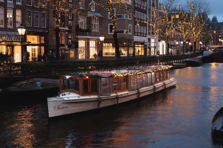 Amsterdam: Open Boat Cruise option Unlimited Drinks & Bite - Skinny Bridge, Hermitage Museum, and the Amstel Hotel