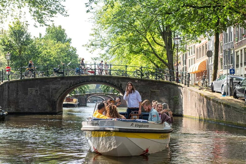 Amsterdam: Open Boat Tour of Canals with Expert Local Guide - Why Amsterdam’s canals are best seen from a low boat