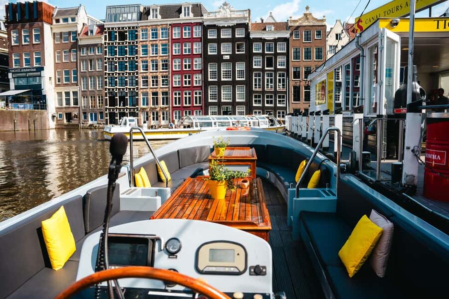 Amsterdam: Open Boat Tour of Canals with Expert Local Guide - Magere Brug and the smaller waterways