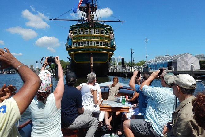 Amsterdam Open Boat Tour with Local Guide - Weather, clothing, and practical comfort