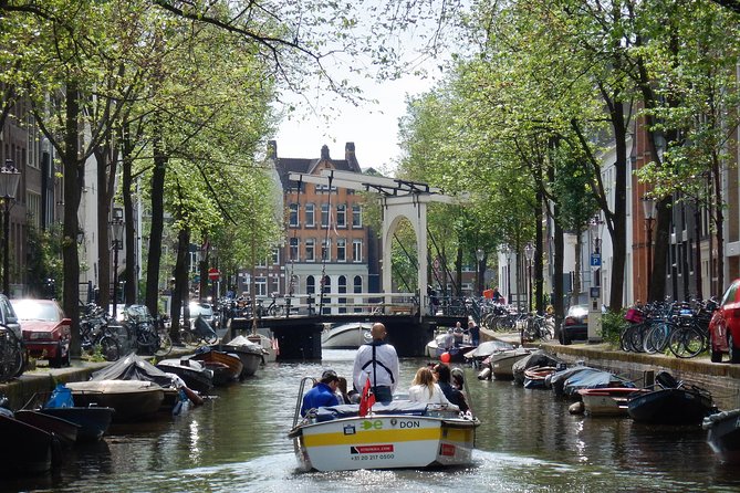 Amsterdam Open Boat Tour with Local Guide - Who will enjoy this canal tour most?