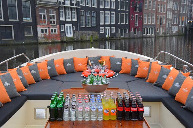 Amsterdam Private BBQ and Drinks Cruise With Onboard Chef - Amsterdam Centraal and Montelbaanstoren