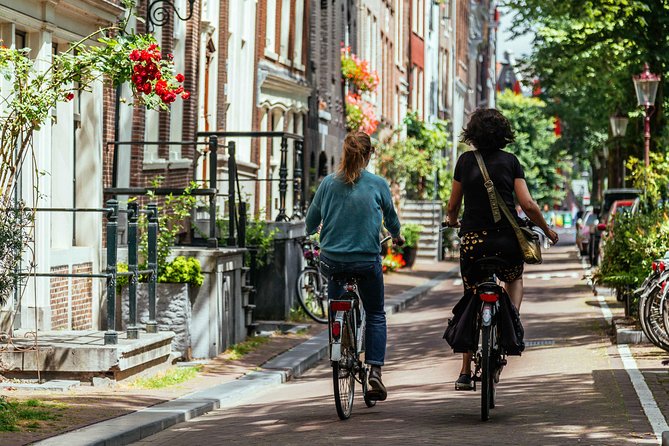 Amsterdam PRIVATE Bike Tour With Locals: Bike & Local Snack Included - The Homomonument and Amsterdam’s modern identity