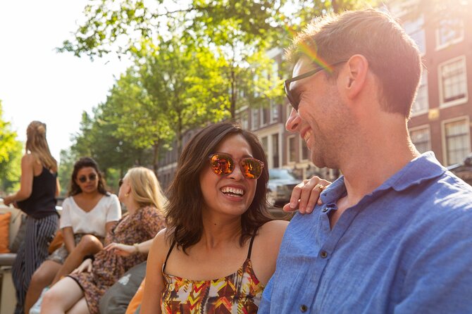 Amsterdam Private Boat Trip with Pizza and Unlimited Drinks - Rembrandtplein, the Old Church, and Centraal Station