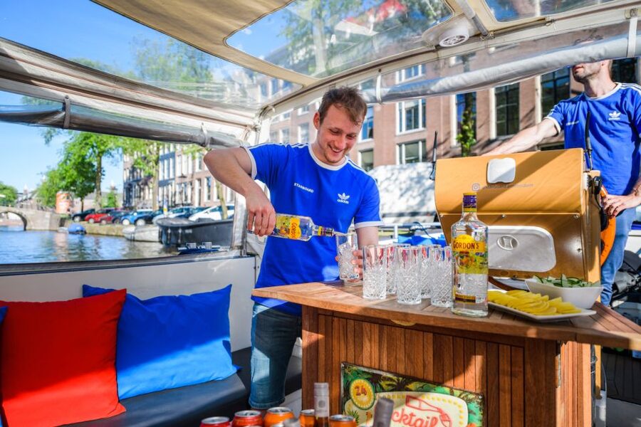 Amsterdam: Private Canal Booze Cruise with Unlimited Drinks - NEMO Science Museum and the eastern waterfront
