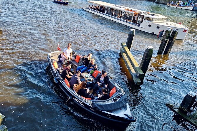 Amsterdam Private Canal Cruise – 90 Minutes through the Old City - Waterlooplein, Zuiderkerk, and the old center