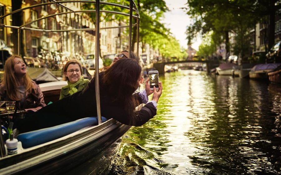 Amsterdam: Private Canal Tour - Meeting the skipper at the light blue roof