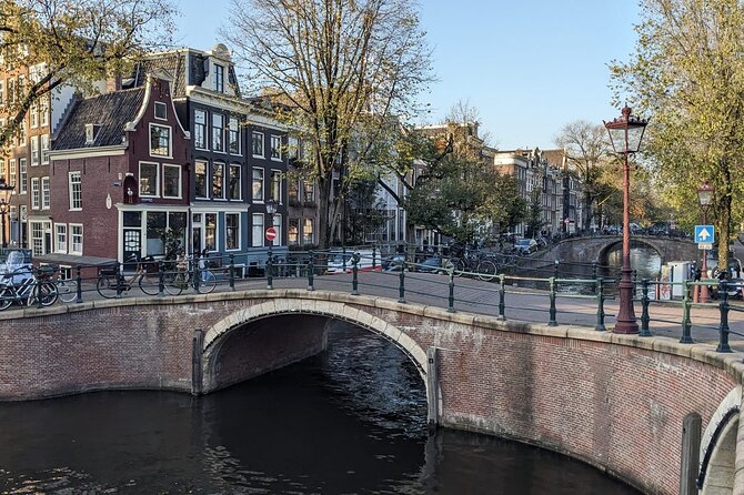 Amsterdam private city walking experience with a local - Nieuwmarkt and the old city gate at the Waag