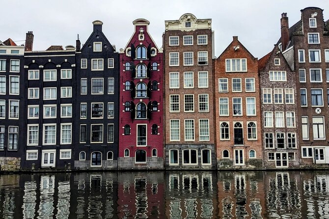 Amsterdam private city walking experience with a local - Dam Square, royal power, and wartime memory