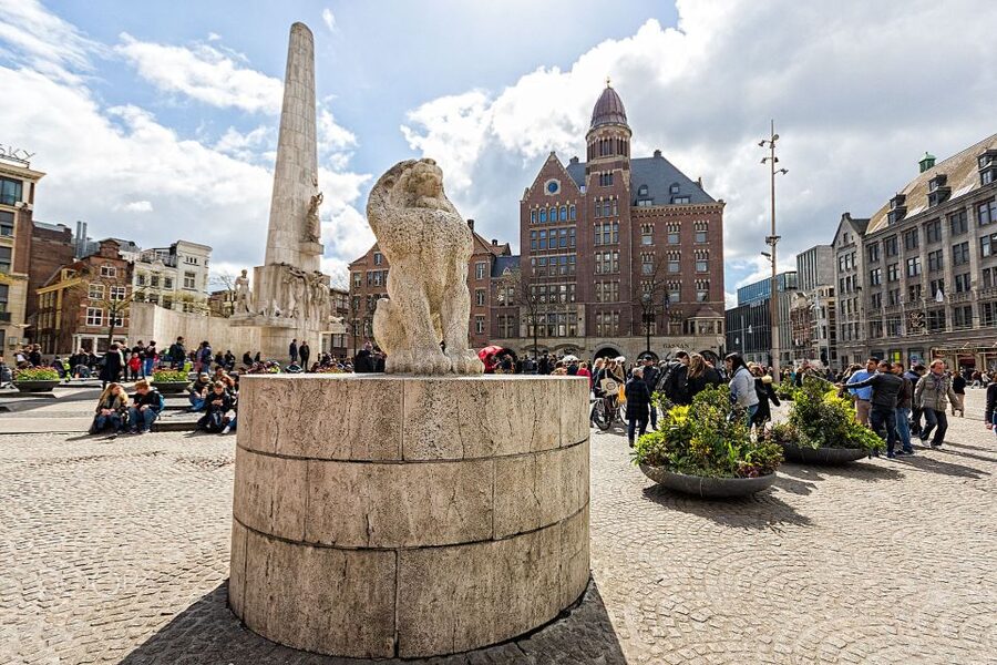 Amsterdam: Private Hidden Gems Discovery Tour - The former main post office and the city’s changing center