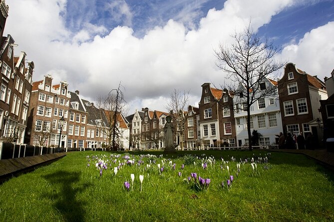 Amsterdam Private Historical Walking Tour - Munt Tower and Spui fill in the city’s details