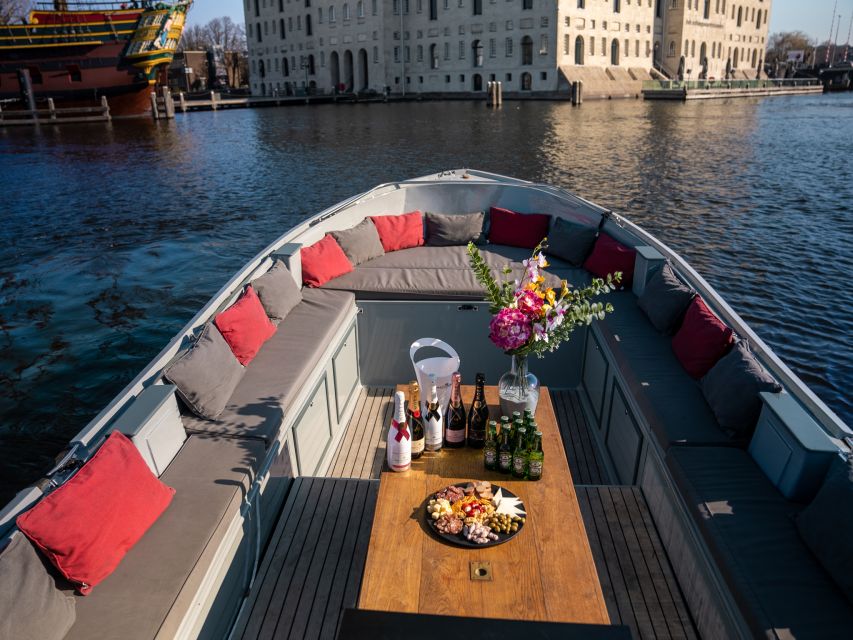 Amsterdam: Private Luxury Cruise with Drinks & Silent Disco - Weather cover is a genuine advantage