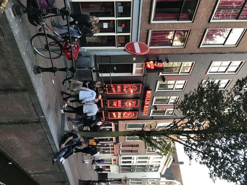 Amsterdam: Private Red Light District and Food Tour - The Flower Market and the canal-center finish