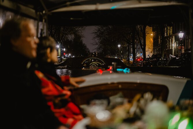Amsterdam: Private Romantic Evening Canal Cruise + Bubbles/Snacks - Comfort in winter and summer