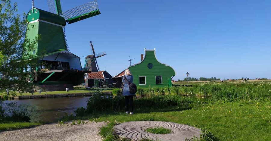 Amsterdam: Rainbow Rural Bike Tour With Local Gay Guide - Wooden houses, polders, and the Dutch way with water