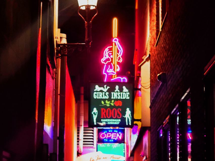 Amsterdam: Red Light District and Coffeeshop Culture Tour - The narrowest street and other small surprises