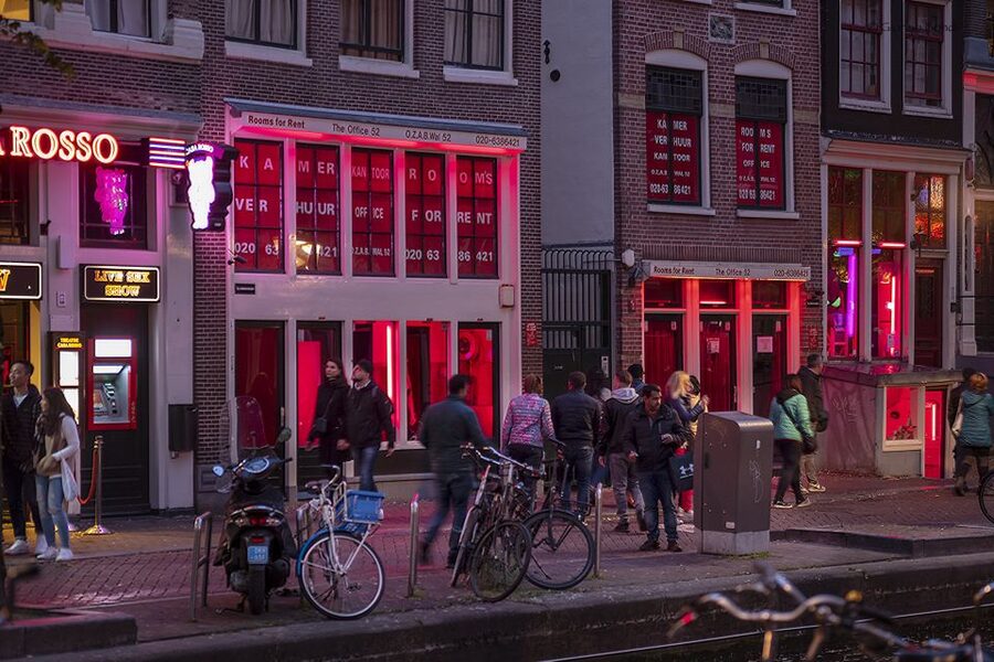 Amsterdam Red Light District and Old Town Walking Tour - Coffeeshops, smart shops, and the first coffeeshop