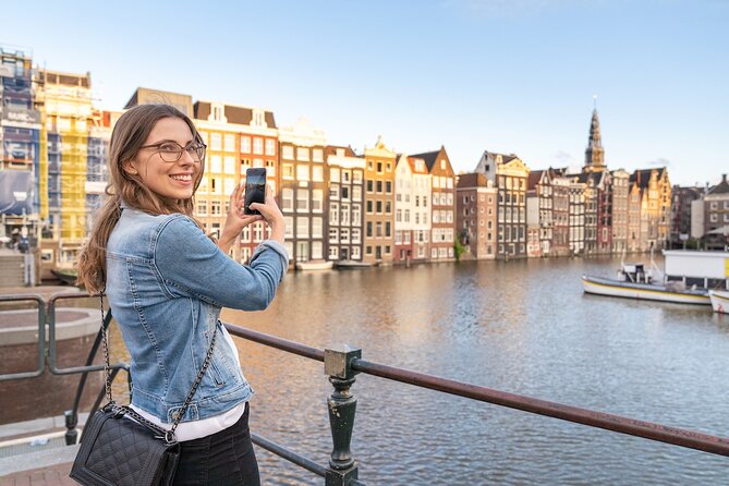 Amsterdam: Red Light District & City Tour (Private tour) - Damrak and the questions you may not ask aloud