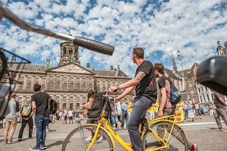 Amsterdam: Relaxed City Highlights Guided Bike Tour - Herengracht and the return to Nieuwezijds Kolk