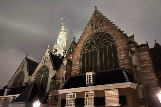 Amsterdam’s Ghostly Experiences Group Tour - Walking beside the Red Light District