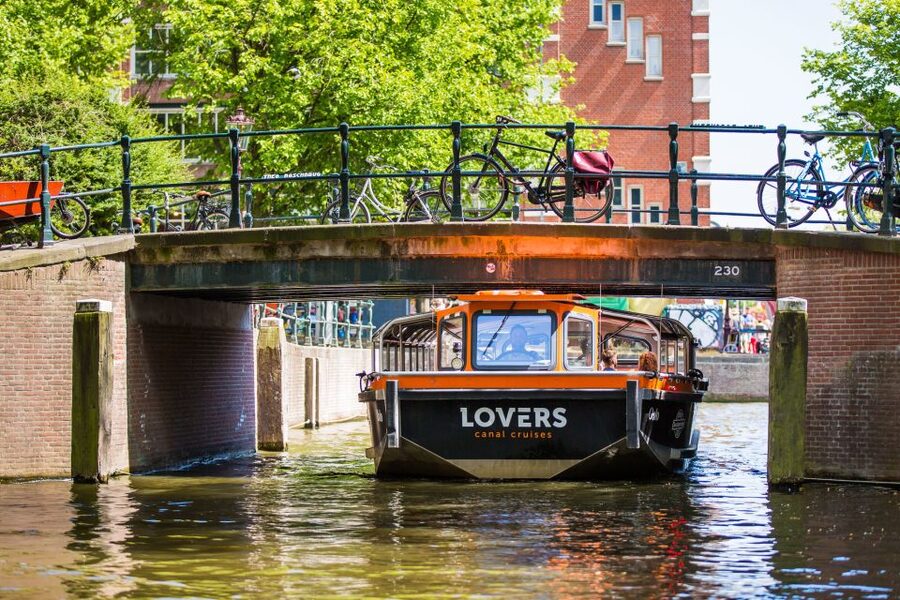 Amsterdam: Semi-Open Canal Boat Cruise - Boarding the semi-open electric boat
